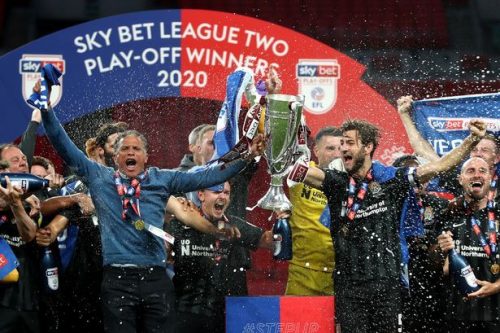 Former student lifts Play-Off Final trophy at Wembley…